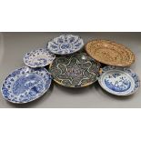 A quantity of various Delft and other chargers, etc. The largest 38 cm diameter.