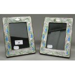 A pair of silver Art Nouveau style photograph frames. 14.5 cm x 19.5 cm.