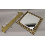 A set of brass hooks and a brass framed mirror. The latter 33.5 cm wide.