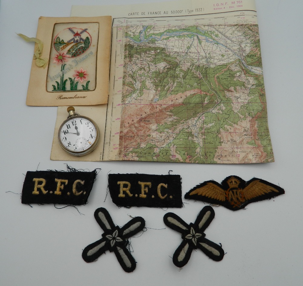 A WWI RFC (Royal Flying Corps) pilot's pocket watch, marked to the reverse,