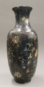 An Oriental papier mache vase. 45.5 cm high.