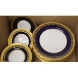 A quantity of Aynsley gilt decorated plates