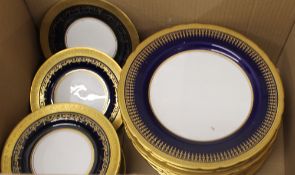 A quantity of Aynsley gilt decorated plates