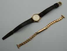 A ladies 9 ct gold cased Omega wristwatch. 2.25 cm wide.