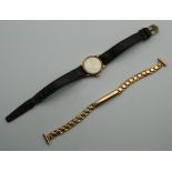 A ladies 9 ct gold cased Omega wristwatch. 2.25 cm wide.