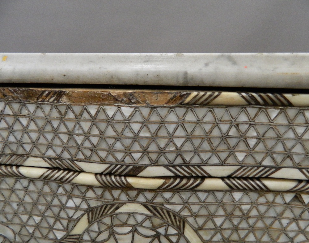 A Syrian mother-of-pearl inlaid chest of drawers with associated marble top. - Image 5 of 25