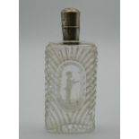 A 19th century unmarked silver topped glass scent bottle, decorated in the Mary Gregory style.