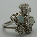 A silver cubic zirconia and opal ring. Ring Size P.