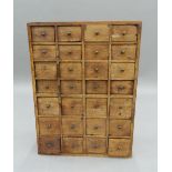 A small mahogany bank of drawers. - WITHDRAWN 51 cm high, 38 cm wide, 19 cm deep.