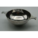 A silver quaich, hallmarked for Edinburgh 1964. 13 cm wide. 111.9 grammes.