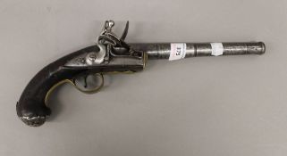 An early 18th century flintlock pistol, stamped ''Farmer''. 35 cm long.