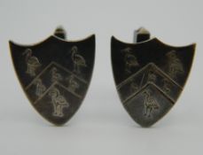 A pair of silver heraldic shield cufflinks. 8.7 grammes.