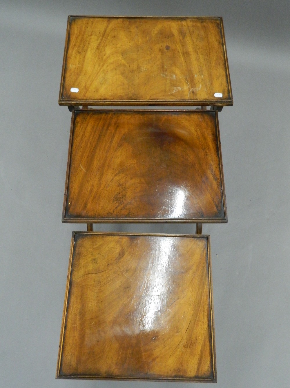A nest of three mahogany tables. 56 cm wide. - Image 3 of 7