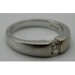 An 18 ct white gold diamond solitaire ring. Ring Size K/L. 6.1 grammes total weight.