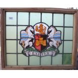 A leaded stained glass panel bearing the Exeter Coat of Arms. 75 cm wide.