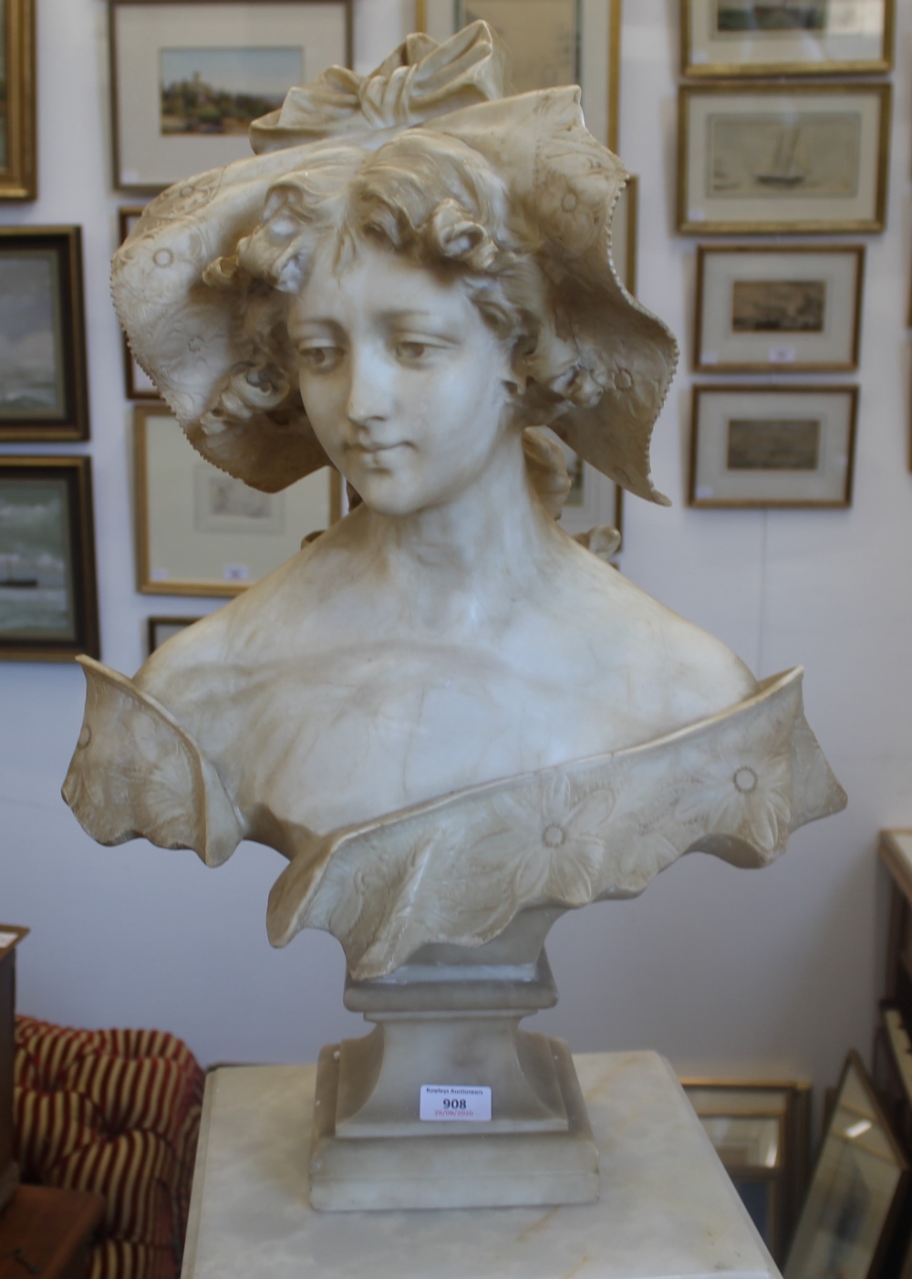 A 19th century carved alabaster bust modelled as a young lady wearing a bonnet, - Image 2 of 8