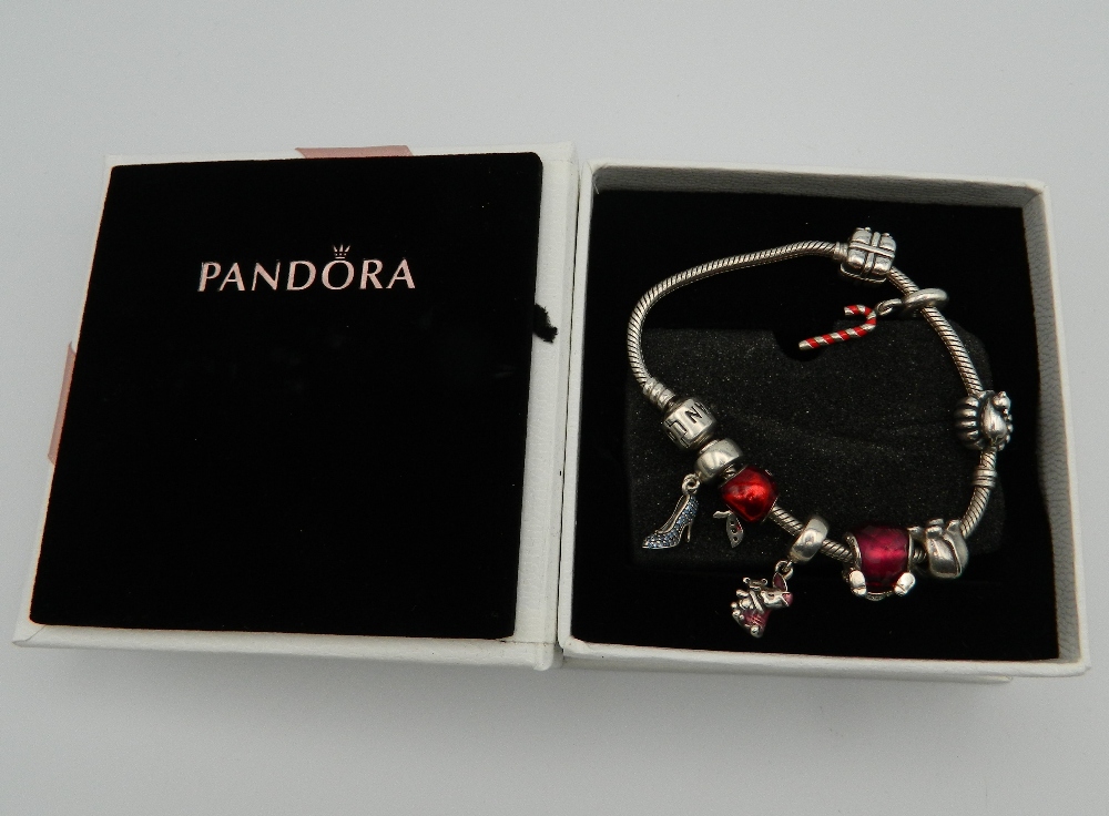 A boxed Pandora bracelet. Approximately 17 cm long.