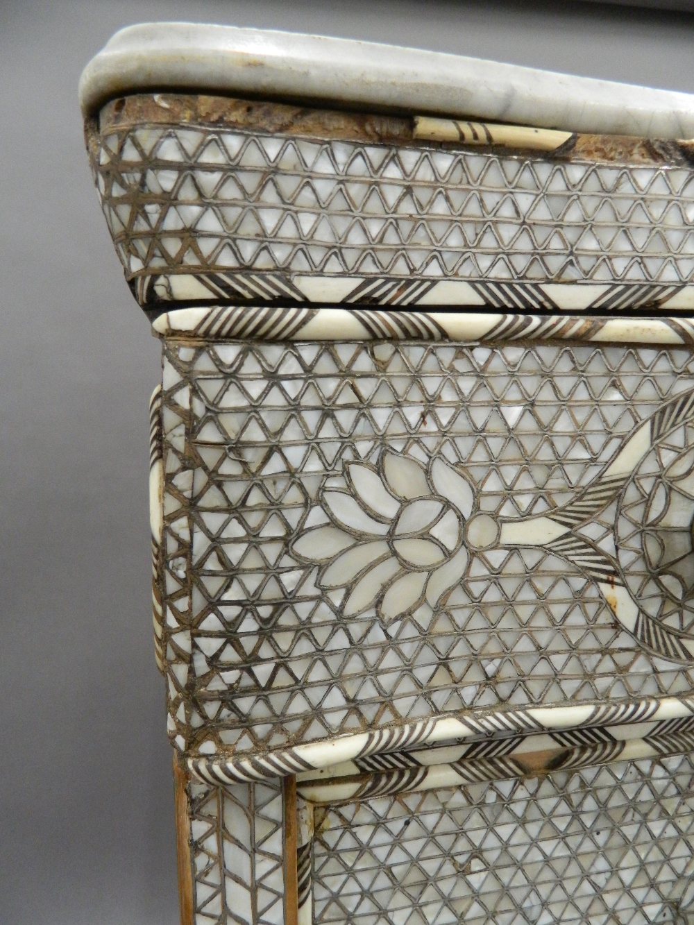 A Syrian mother-of-pearl inlaid chest of drawers with associated marble top. - Image 8 of 25