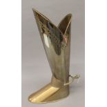A brass boot form stick stand. 52 cm high.