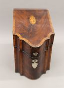 A 19th century inlaid mahogany knife box, with original fitted interior. 36 cm high.