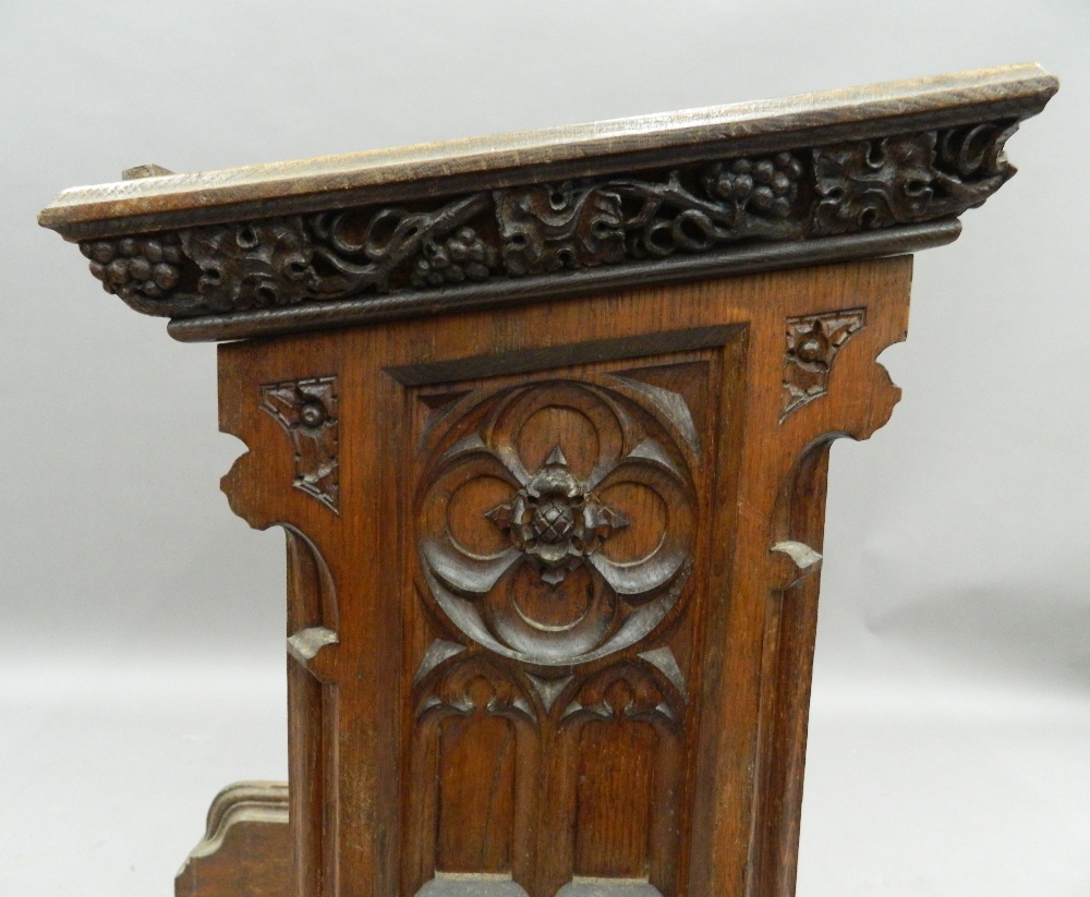 A Victorian carved oak lectern. 68.5 cm wide, 84 cm high, 61 cm deep. - Image 8 of 12