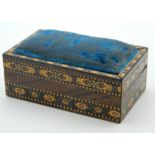 A Victorian Tunbridge Ware pin cushion/box. 7 cm long.