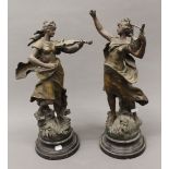 A pair of 19th century spelter figures. The largest 53 cm high.
