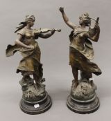 A pair of 19th century spelter figures. The largest 53 cm high.