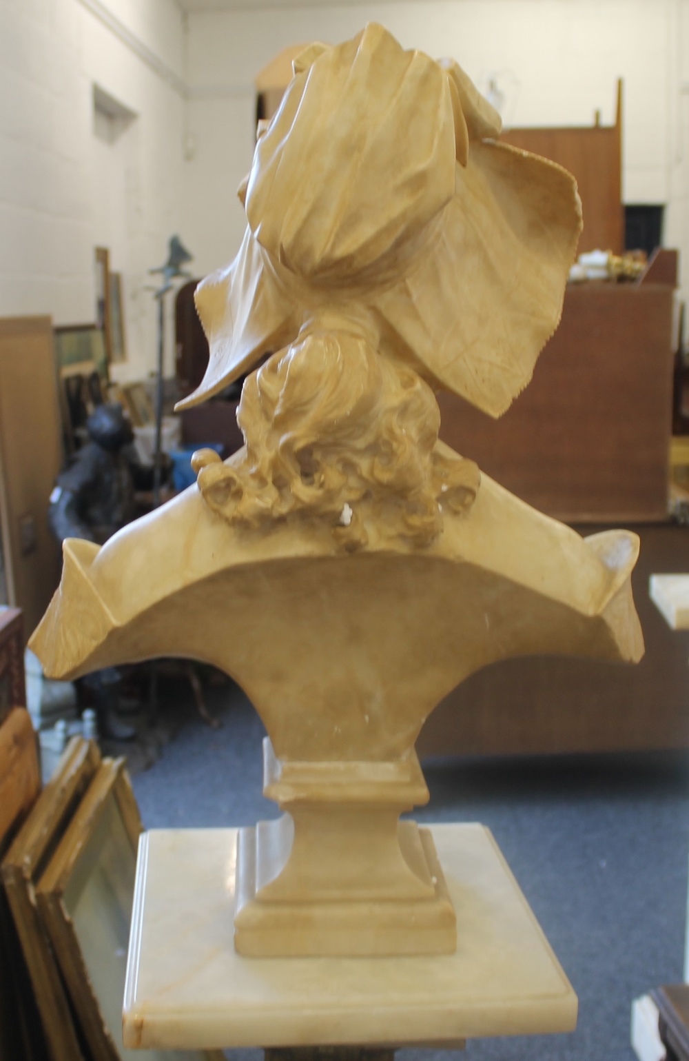 A 19th century carved alabaster bust modelled as a young lady wearing a bonnet, - Image 7 of 8