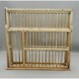 A 19th century pine country house plate rack. 114.5 cm wide. The property of Germaine Greer.