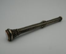 A Victorian silver propelling pen and pencil. 9 cm long.