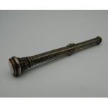A Victorian silver propelling pen and pencil. 9 cm long.