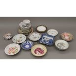 A collection of various 18th/19th century porcelain dishes, saucers, etc.
