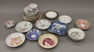 A collection of various 18th/19th century porcelain dishes, saucers, etc.