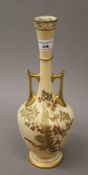 A Royal Worcester blush ivory twin handled vase. 32 cm high.