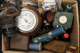 A quantity of miscellaneous items including: dominoes, a gas mask, clocks, etc.