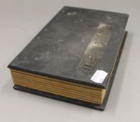 A Chinese book set with red jade panels. 14.5 cm wide.