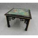 A Chinese coffee table. 61 cm wide.