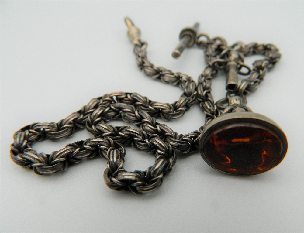 An unmarked silver watch chain, together with key and fob. 34 cm long. - Image 3 of 3