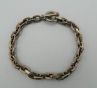 A silver bracelet. 22 cm long. 35.9 grammes.