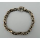 A silver bracelet. 22 cm long. 35.9 grammes.