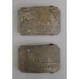 Two brass buckles. Each 9 cm wide.