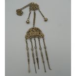A Chinese white metal chatelaine. 33 cm high.