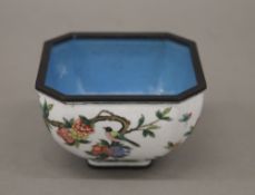A Chinese bronze and enamel bowl. 7.5 cm wide.