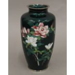 A Japanese green ground cloisonne vase. 21.5 cm high.