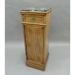A 19th century mahogany marble topped pedestal cupboard. 98 cm high.