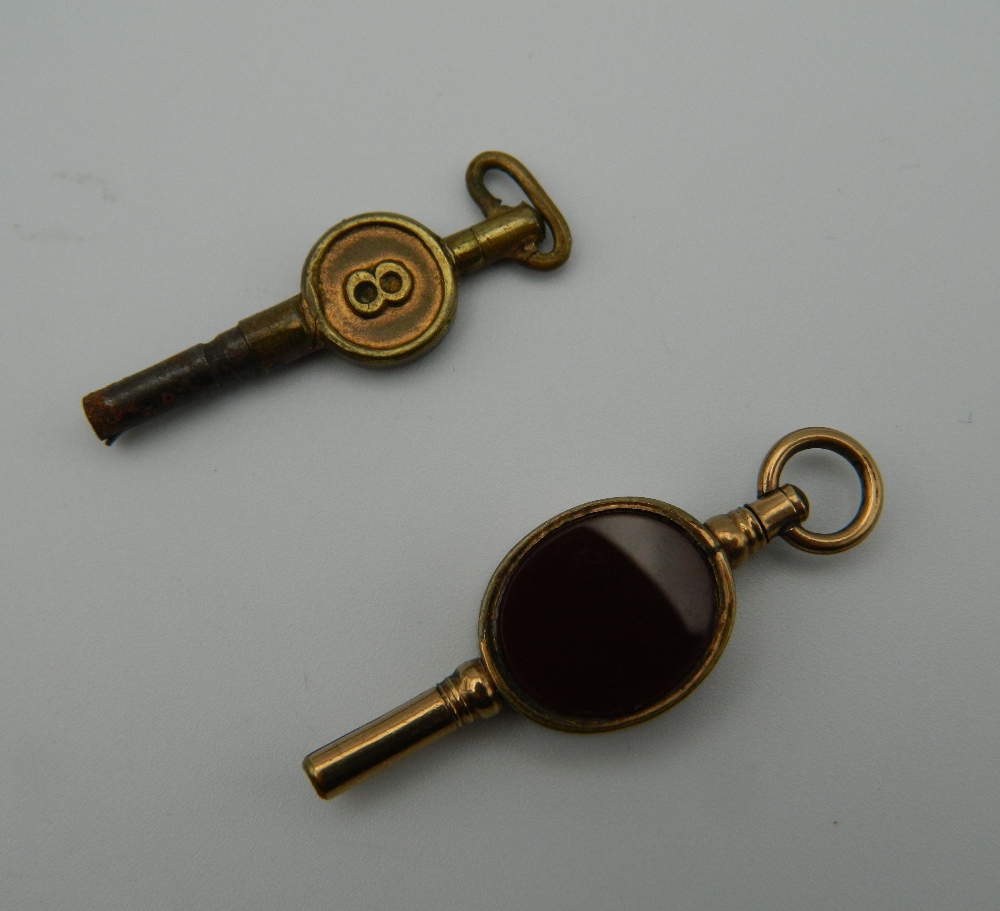 A Victorian carnelian set watch fob key and another. The former 4 cm high. - Image 2 of 3