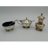 A silver three-piece cruet. 117.7 grammes.