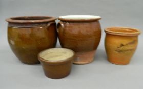 A quantity of early 20th century earthenware crocks, etc.