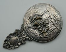 A Danish silver plated hand mirror.